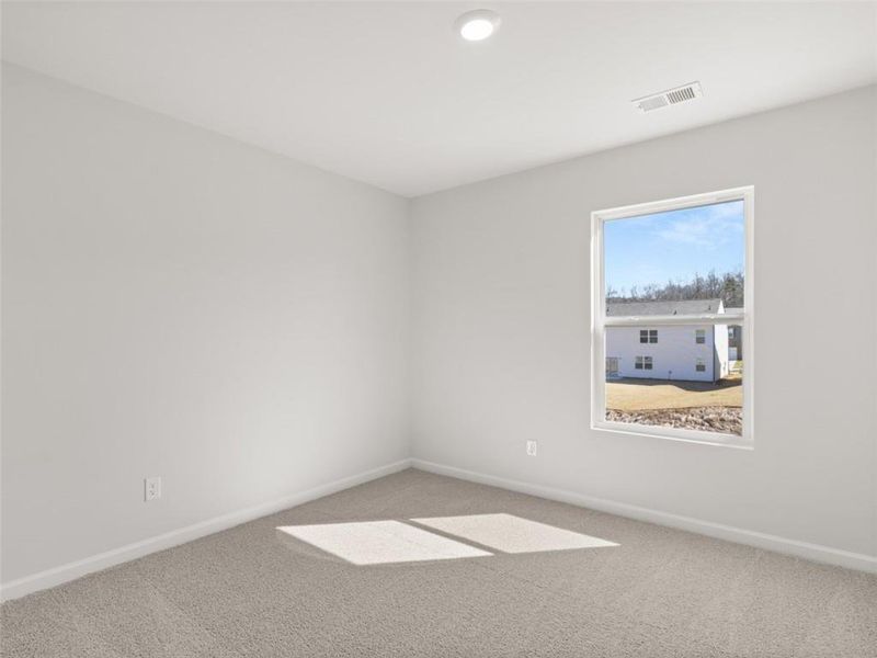 Spacious, unfurnished interior of a new home in Oaks at Cedar Grove, Fairburn (Image 30).