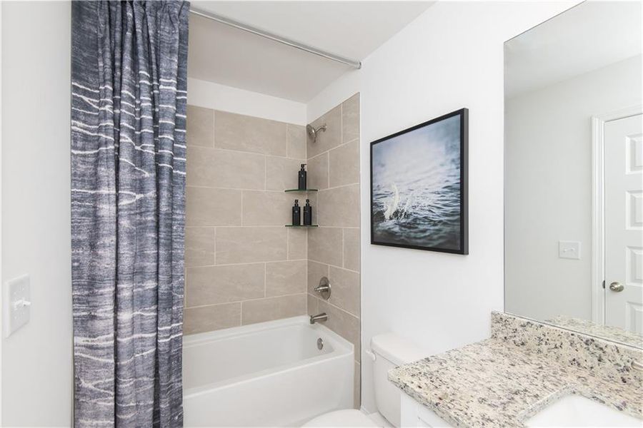 Furnished interior view inside a new home in Towns at Enclave, Lawrenceville (Image 13). Furnished interior view inside a new home in Towns at Enclave, Lawrenceville (Image 13).