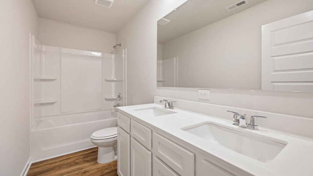 Furnished interior view inside a new home in Shoal Creek, Hampton (Image 6).