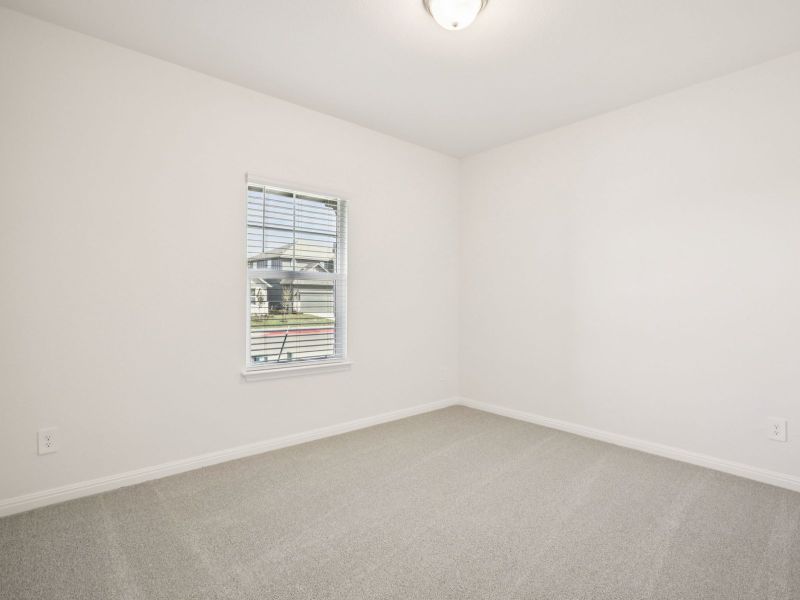 Spacious, unfurnished interior of a new home in Prairie Winds - Boulevard Collection, Hutto (Image 12).