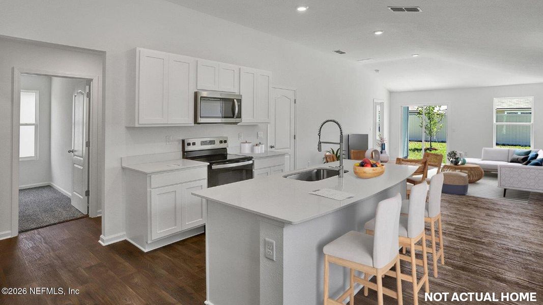 Furnished interior view inside a new home in Grand Reserve, Bunnell (Image 4).