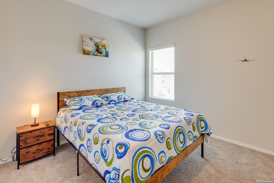 Furnished interior view inside a new home in Melissa Ranch, San Antonio (Image 30).