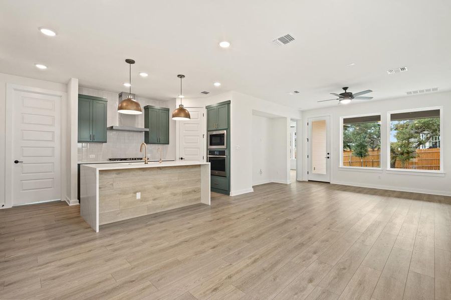 Furnished interior view inside a new home in Heritage, Dripping Springs (Image 6).