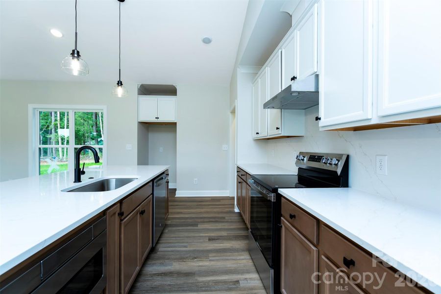 Furnished interior view inside a new home in , Monroe (Image 6).