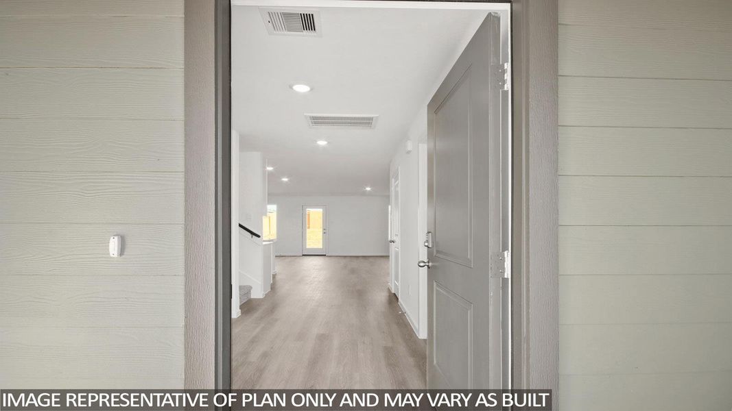 Hall featuring recessed lighting and light wood-style flooring Hall featuring recessed lighting and light wood-style flooring