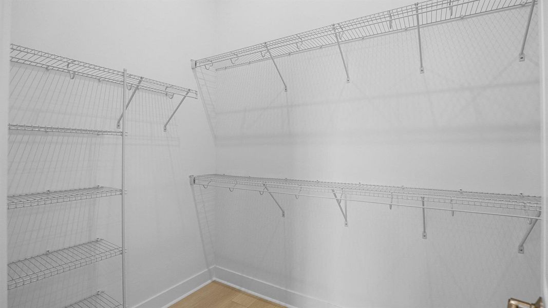 Furnished interior view inside a new home in L'Ambiance at Avenir, Palm Beach Gardens (Image 18). Furnished interior view inside a new home in L'Ambiance at Avenir, Palm Beach Gardens (Image 18).