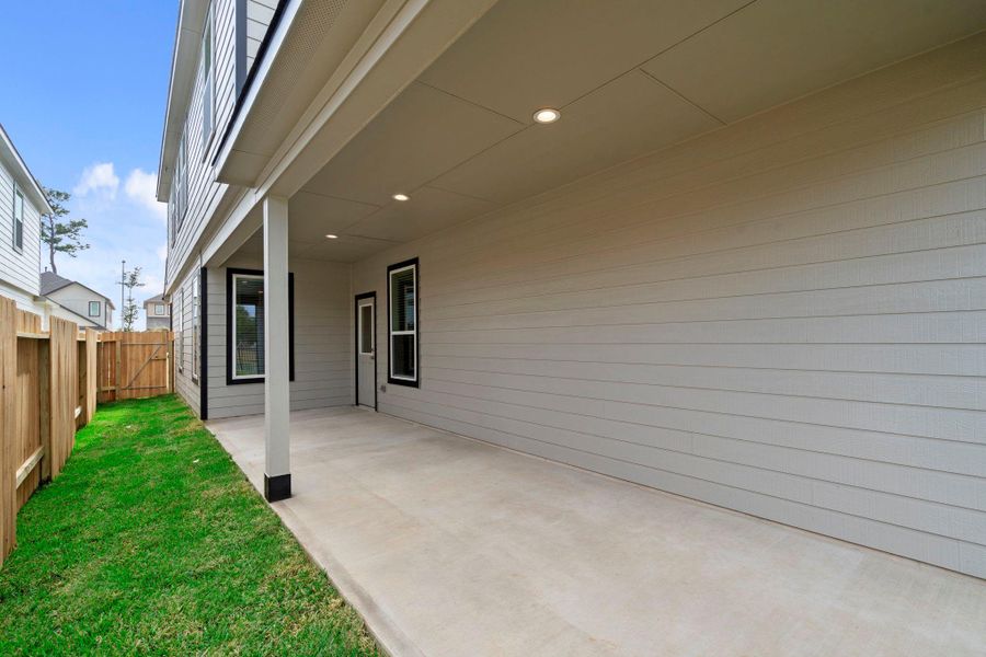 Exterior details and patio area of a home in Cypresswood Landing, Humble (Image 3). Exterior details and patio area of a home in Cypresswood Landing, Humble (Image 3).