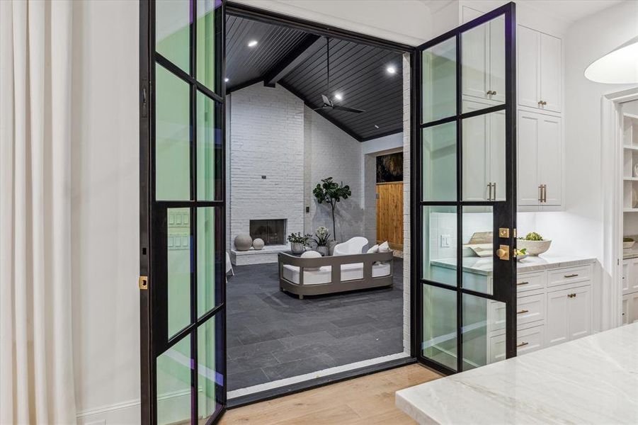 Bring the indoors outside through these double steel/glass doors