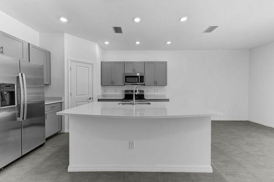 Furnished interior view inside a new home in Vinterra Townhomes, Nokomis (Image 5).