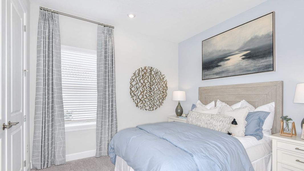 Furnished interior view inside a new home in Esplanade at Tradition, Port St. Lucie (Image 12).