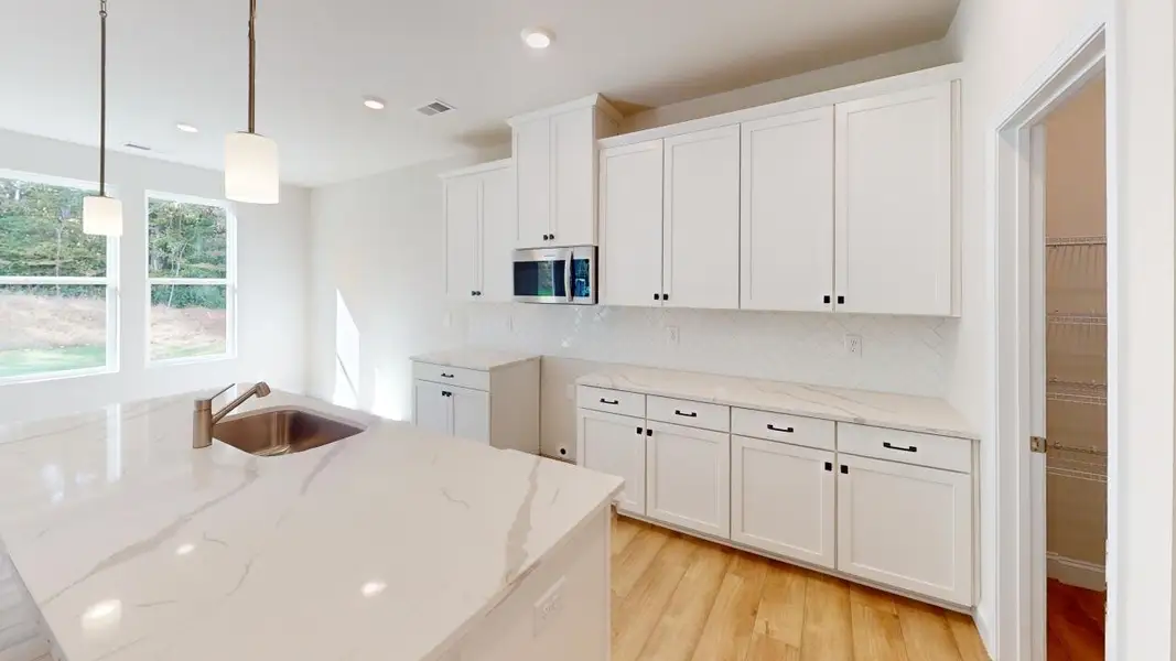 Representative furnished interior of a home built from the Melton Basement by Brookline Homes in The Terraces at Cramerton Mills, Gastonia (Image 4).
