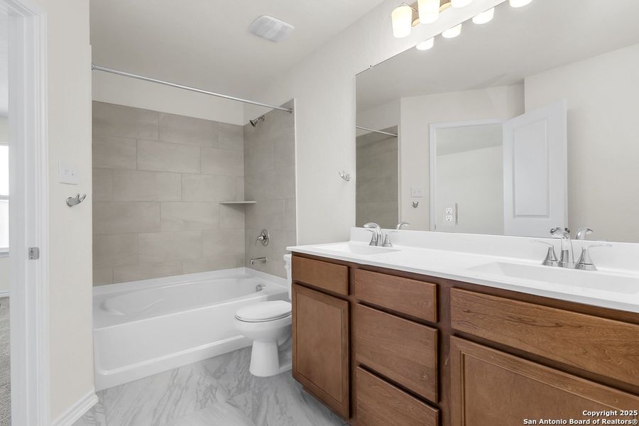 Furnished interior view inside a new home in Spanish Trails, San Antonio (Image 7).