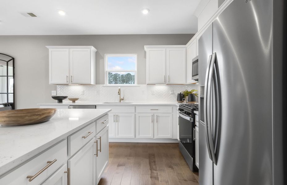 Furnished interior in a model home at Enclave at Parkway Village in Fairburn (Image 12).