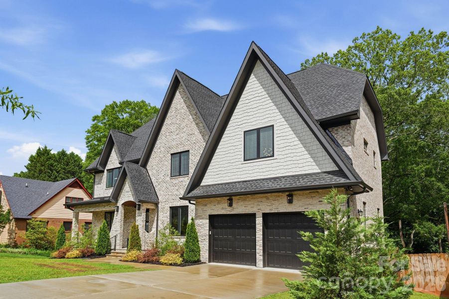 Front exterior of a new home in , Charlotte, NC, highlighting curb appeal (Image 24).
