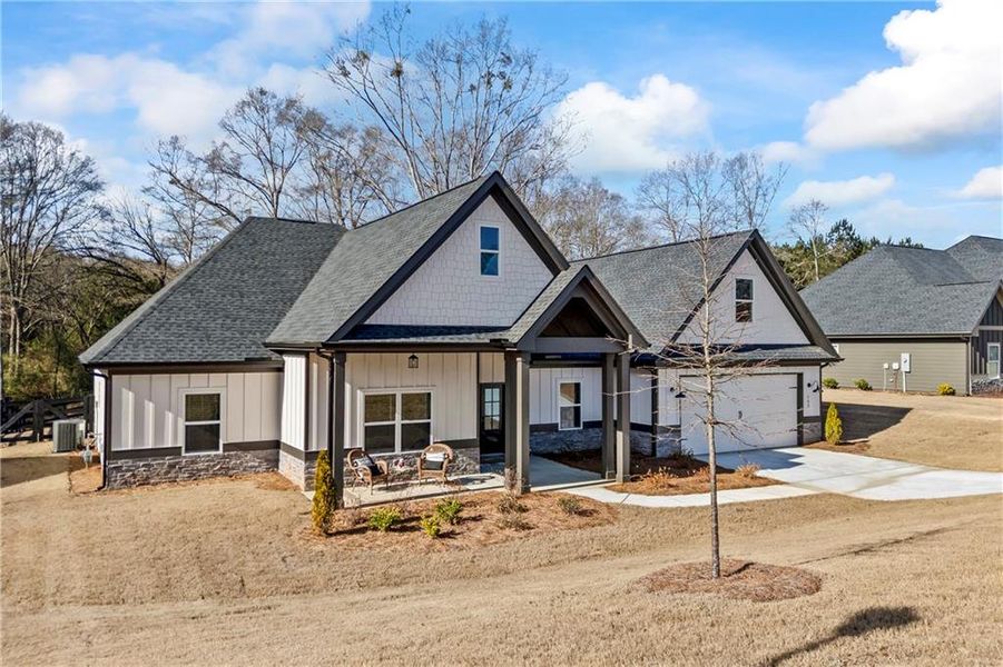 Front exterior of a new home in , Monroe, GA, highlighting curb appeal (Image 26).