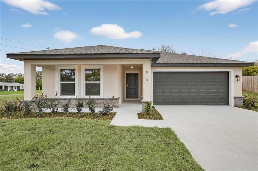Front exterior of a new home in , Spring Hill, FL, highlighting curb appeal (Image 21). Front exterior of a new home in , Spring Hill, FL, highlighting curb appeal (Image 21).