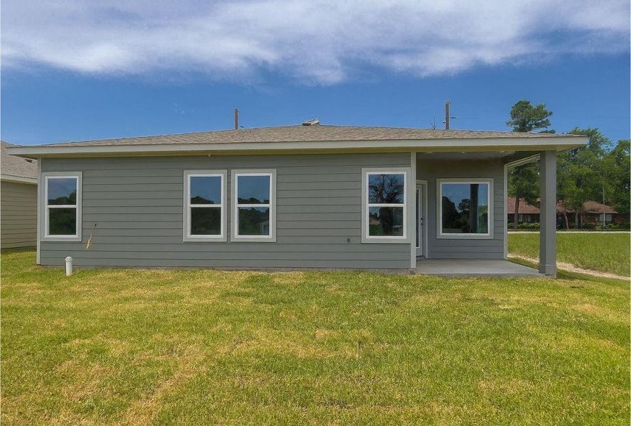 Front exterior of a new home in , Trinity, TX, highlighting curb appeal (Image 1). Front exterior of a new home in , Trinity, TX, highlighting curb appeal (Image 1).