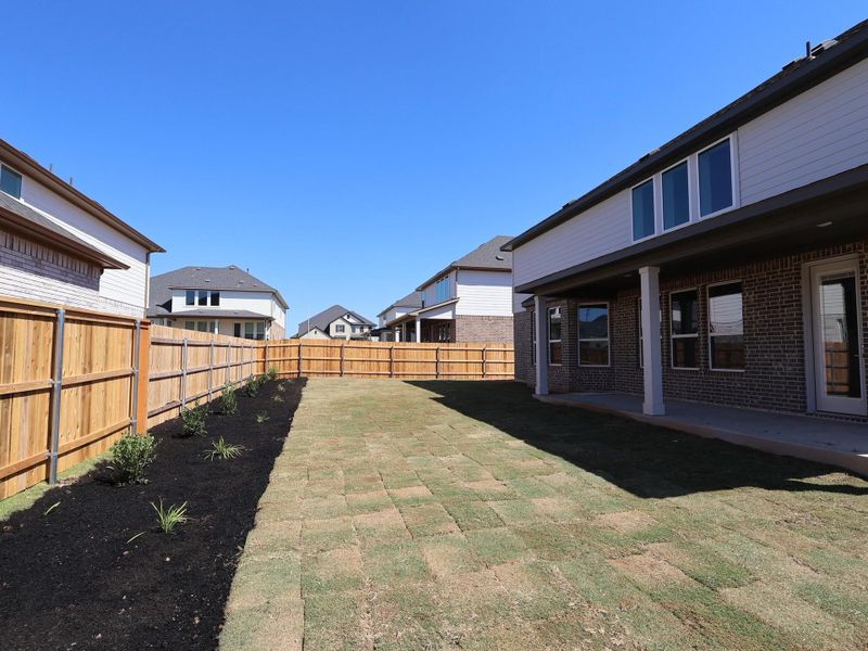 Exterior details and patio area of a home in Edgewood, Leander (Image 21). Exterior details and patio area of a home in Edgewood, Leander (Image 21).