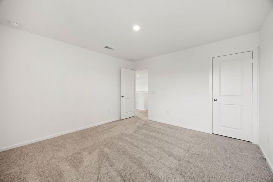 Clean lines, neutral colors, and ample wall space create a blank canvas ready for your personal style.