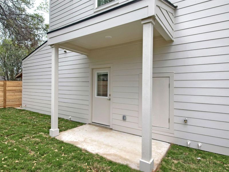 Entrance to property featuring a patio