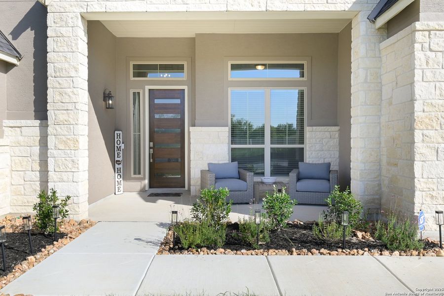 Front exterior of a new home in Mesa Western, Cibolo, TX, highlighting curb appeal (Image 19).