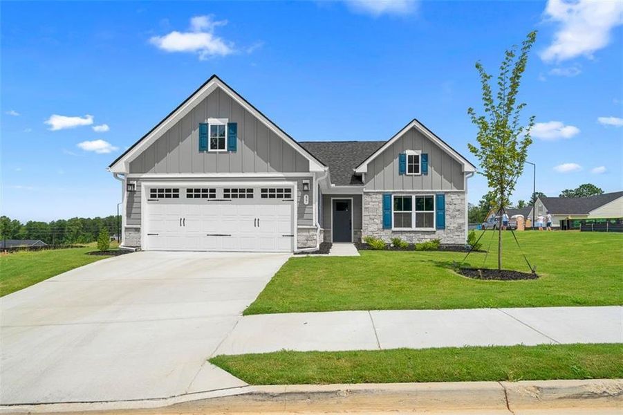 Front exterior of a new home in , Dallas, GA, highlighting curb appeal (Image 23).