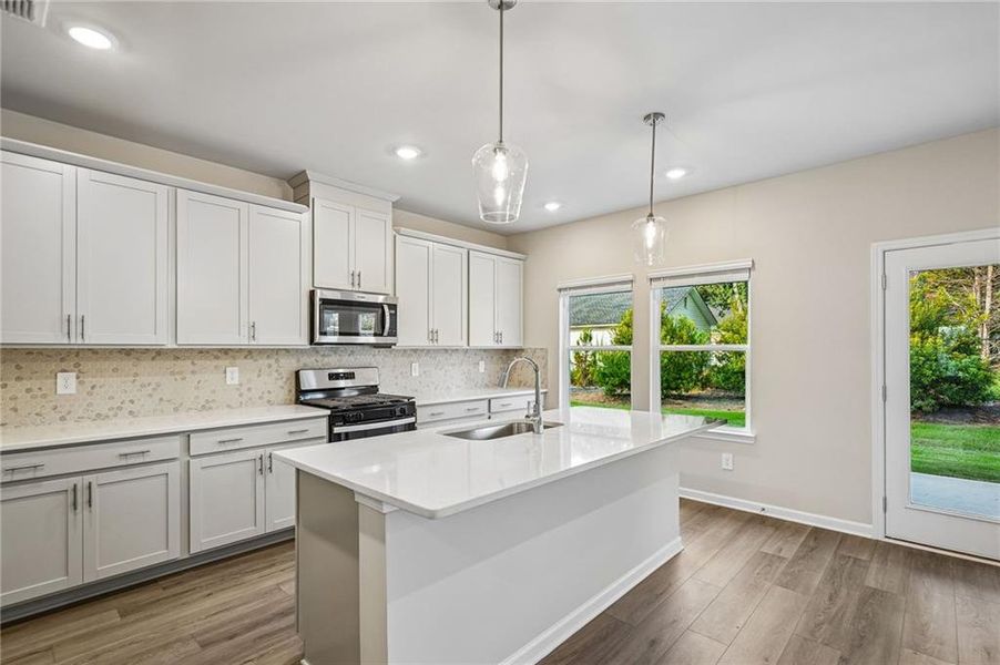 Furnished interior view inside a new home in Martin Springs - Estate Series, Lawrenceville (Image 8).