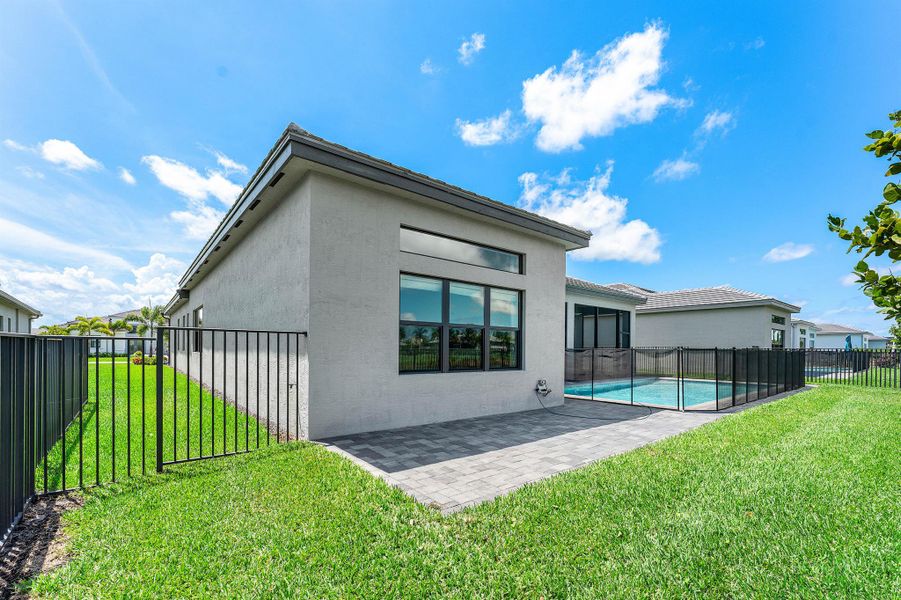 Exterior details and patio area of a home in Valencia Grand, Boynton Beach (Image 25). Exterior details and patio area of a home in Valencia Grand, Boynton Beach (Image 25).