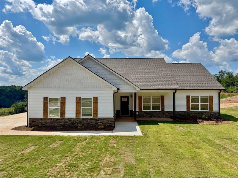Front exterior of a new home in , Eastanollee, GA, highlighting curb appeal (Image 16). Front exterior of a new home in , Eastanollee, GA, highlighting curb appeal (Image 16).