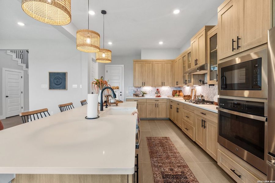 Furnished interior view inside a new home in Village at Three Oaks, Seguin (Image 14).