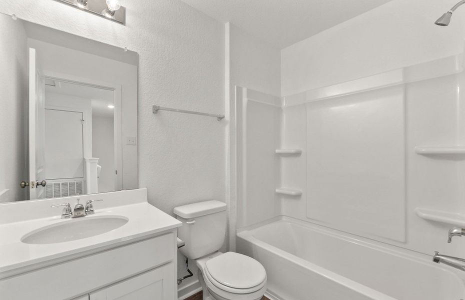 Furnished interior view inside a new home in Sunfield, Buda (Image 10).