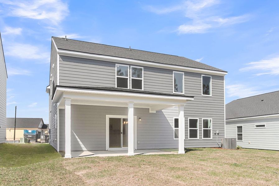 Exterior details and patio area of a home in , Ravenel (Image 4).