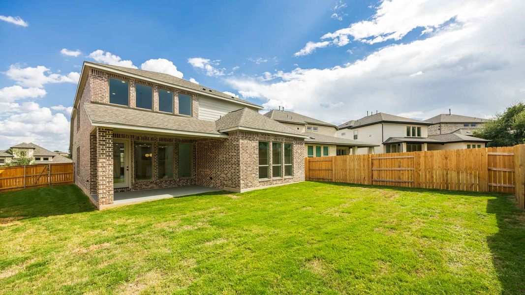 Exterior details and patio area of a home in Parkside on the River, Georgetown (Image 3).