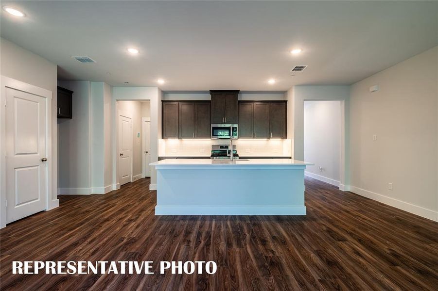 No shortage of prep space, storage space or style in this fantastic home!  REPRESENTATIVE PHOTO