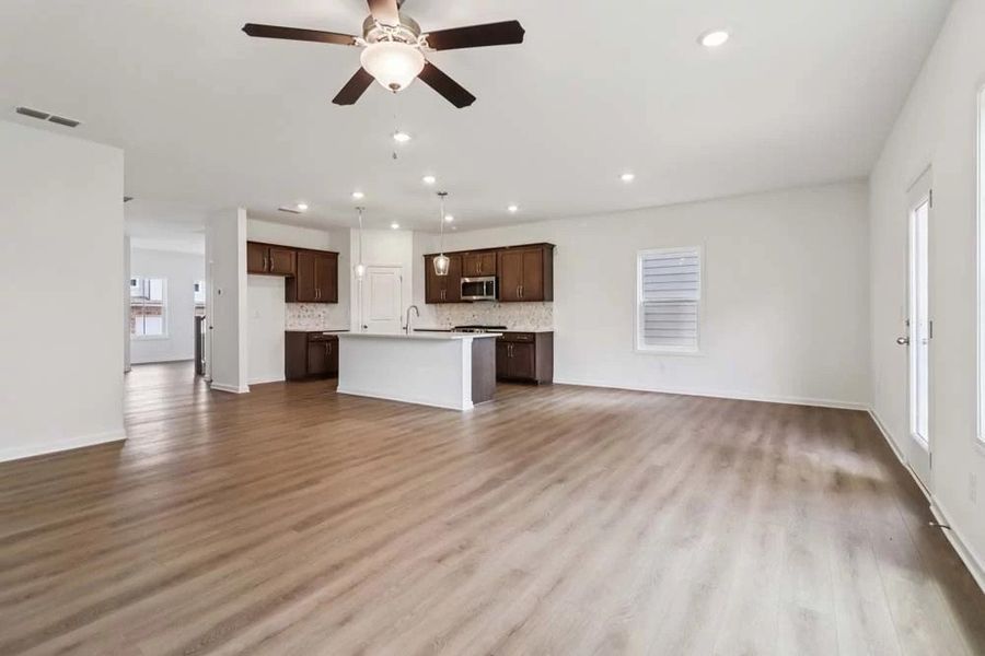 Sample Photo: Family Room & Kitchen Sample Photo: Family Room & Kitchen