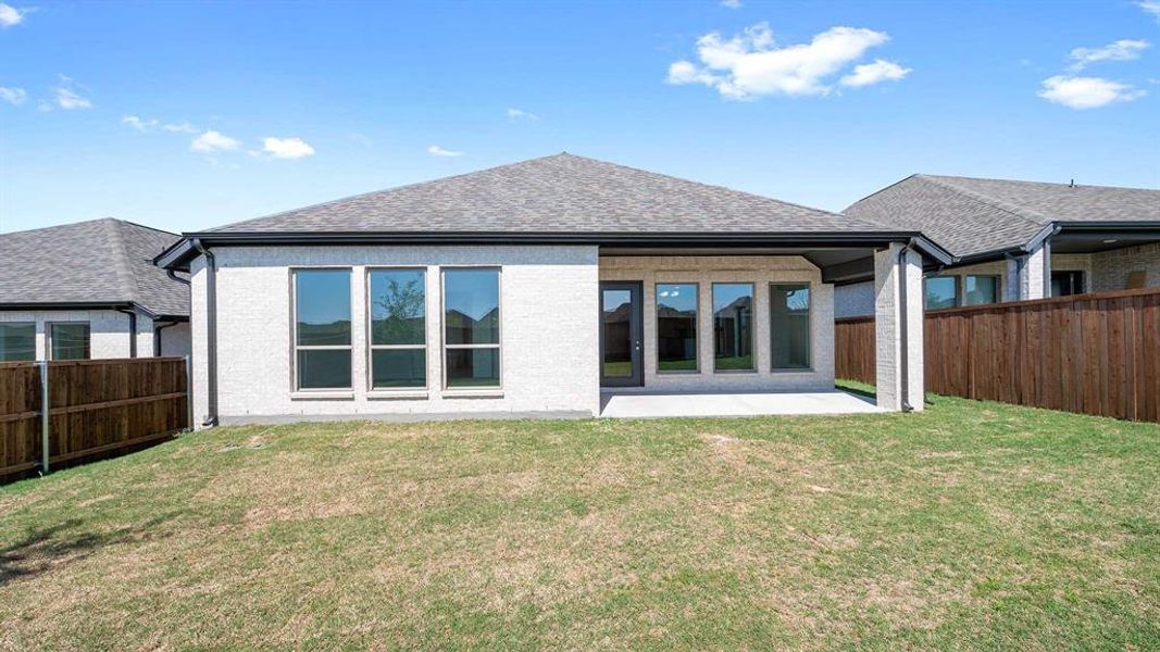 Exterior details and patio area of a home in Devonshire, Forney (Image 2).