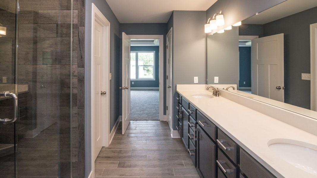 Representative furnished interior of a home built from the The Hartland by Norfolk Homes in Coronado Estates, Jackson (Image 17).