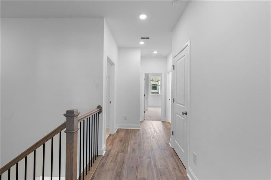 upstairs hallway - Pictures represent a previously built home