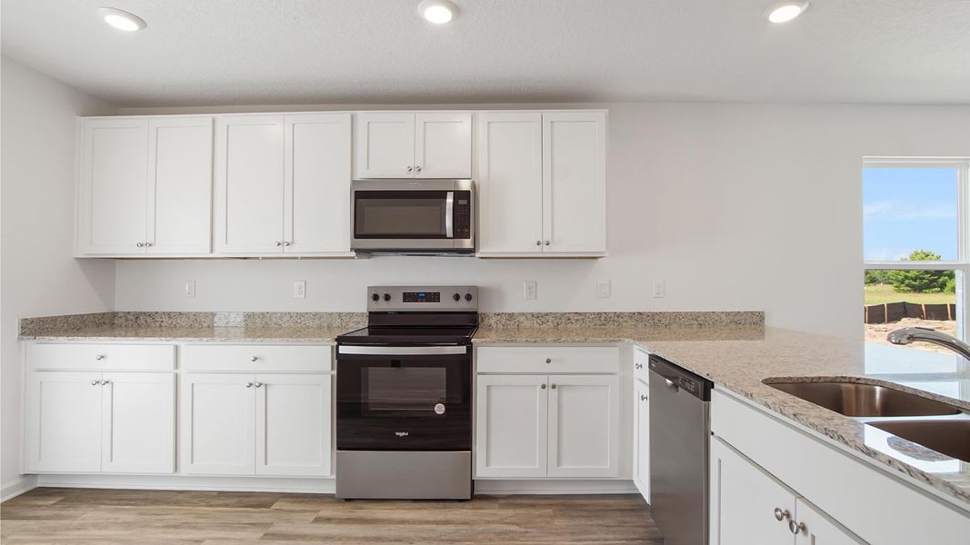 Representative furnished interior of a home built from the Inzer by D.R. Horton in Owl's Head East, Freeport (Image 6). Representative furnished interior of a home built from the Inzer by D.R. Horton in Owl's Head East, Freeport (Image 6).