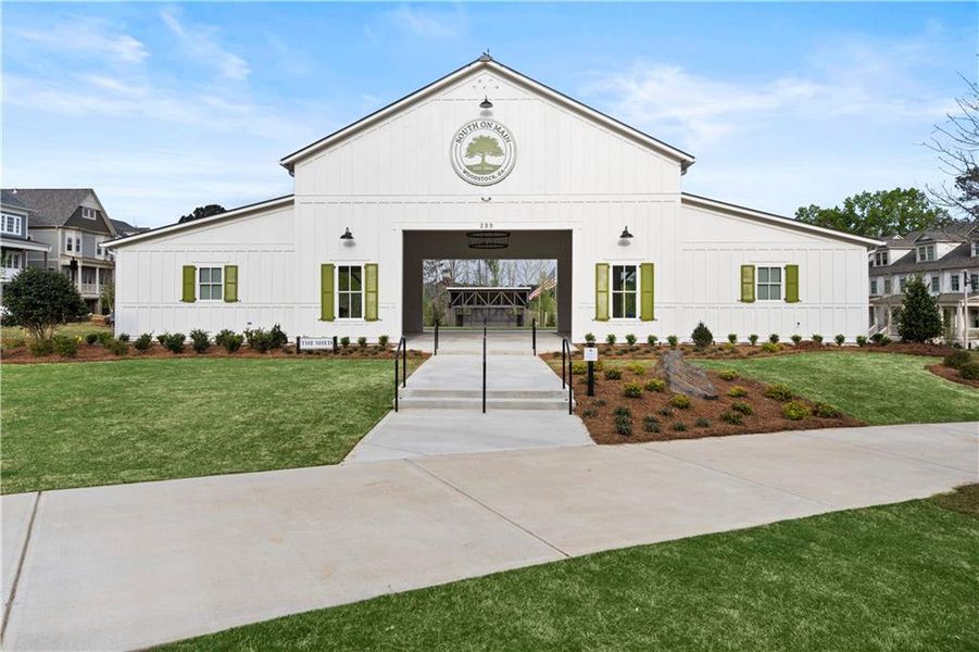 Front exterior of a new home in South on Main, Woodstock, GA, highlighting curb appeal (Image 24).