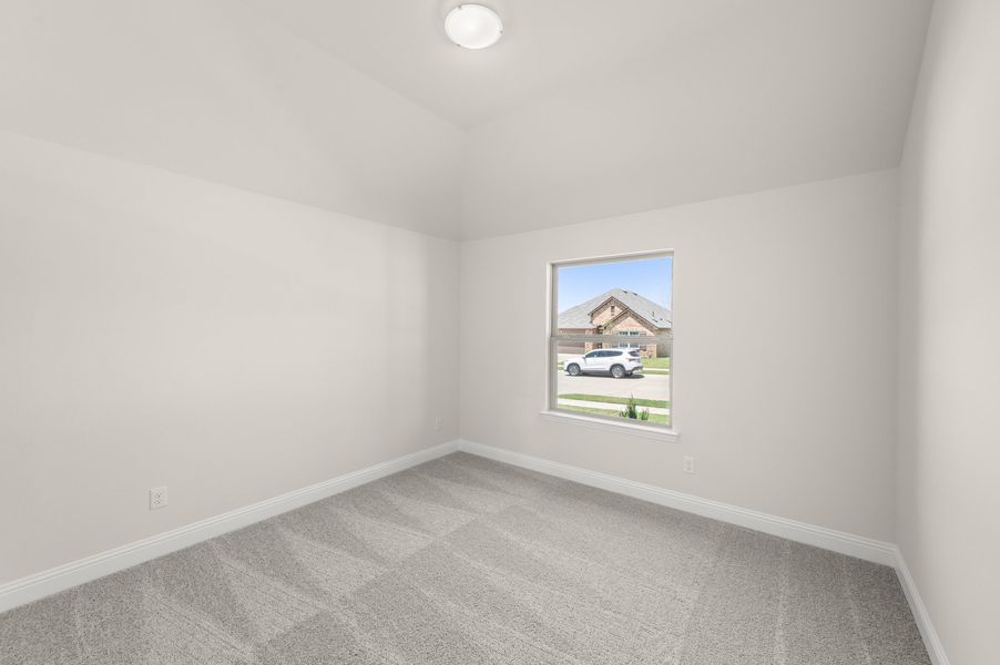 Front exterior of a new home in Still Water Lake Estates, Godley, TX, highlighting curb appeal (Image 22).