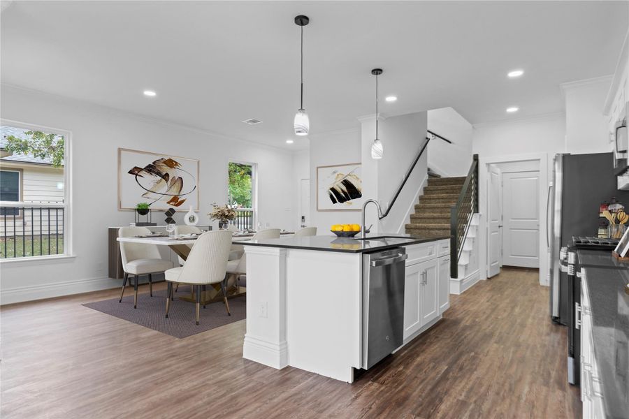 What a beautiful view of the bright and cheerful casual dining area and the gourmet kitchen. Just down the hallway to the left, you’ll find the conveniently located half bathroom, perfectly placed for guests. *Virtually staged* What a beautiful view of the bright and cheerful casual dining area and the gourmet kitchen. Just down the hallway to the left, you’ll find the conveniently located half bathroom, perfectly placed for guests. *Virtually staged*