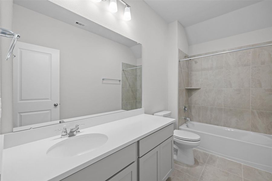 Furnished interior view inside a new home in The Woodlands Hills, Willis (Image 9).