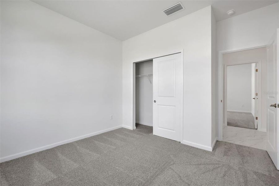 Spacious, unfurnished interior of a new home in Brystol North at Wylder, Port St. Lucie (Image 21).