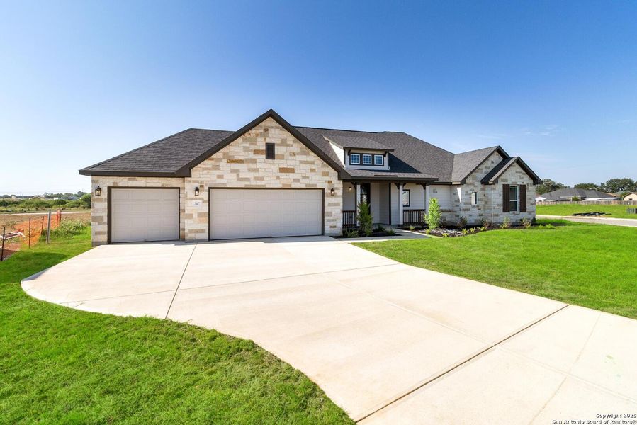 Front exterior of a new home in Bonita Vista, Pleasanton, TX, highlighting curb appeal (Image 16).
