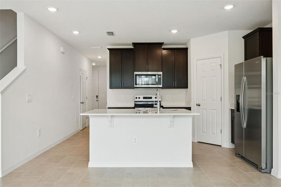 Furnished interior view inside a new home in Cagan Crossings West, Clermont (Image 11).