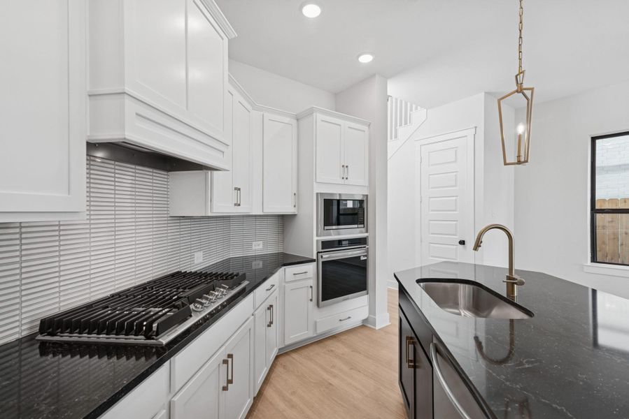 Furnished interior view inside a new home in The Highlands 40', Porter (Image 8).