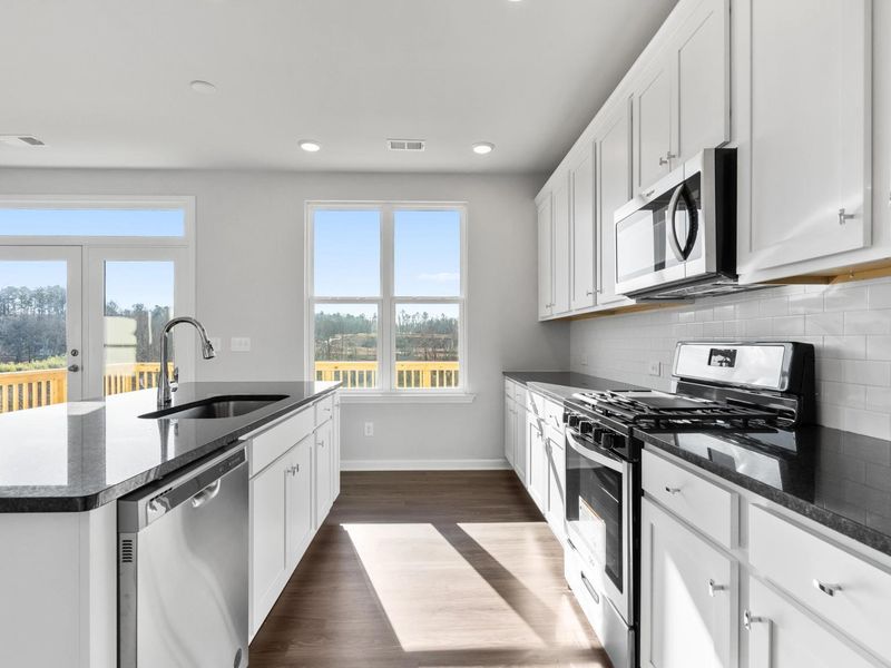 Representative furnished interior of a home built from the The Danbury C by Davidson Homes LLC in Melody Lakeside Estates, Buford (Image 6). Representative furnished interior of a home built from the The Danbury C by Davidson Homes LLC in Melody Lakeside Estates, Buford (Image 6).