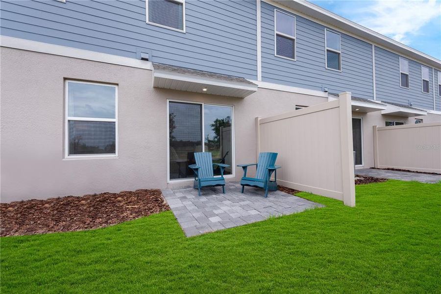 Exterior details and patio area of a home in Avalon Park Tavares Single Family Homes, Tavares (Image 4).