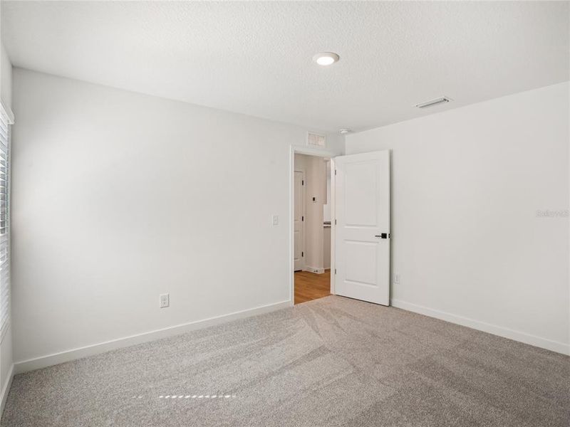 Spacious, unfurnished interior of a new home in Trilby Crossing, Brooksville (Image 7).